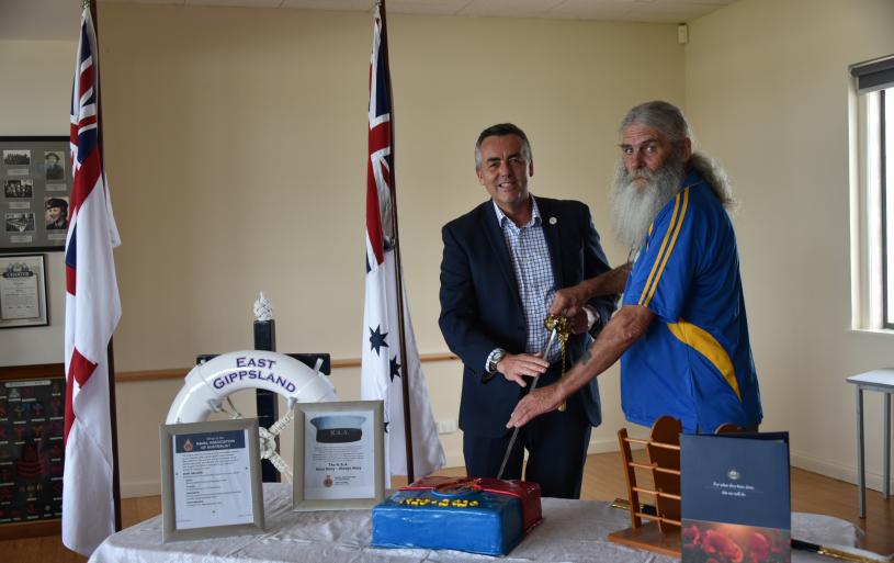 Minister Chester and Peter Tunnage cutting of the NAA Centenary Cake  7 February 2021